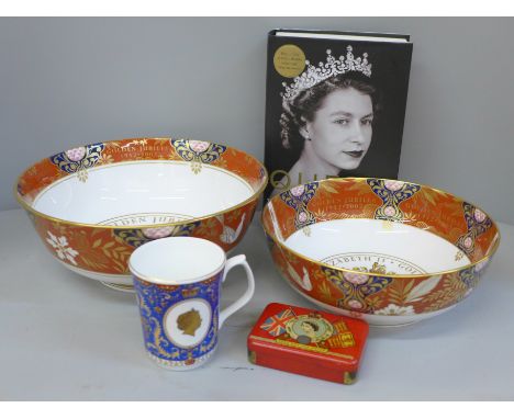 Two Royal Worcester Queen Elizabeth II Golden Jubilee porcelain bowls, a mug, book and Coronation tin 