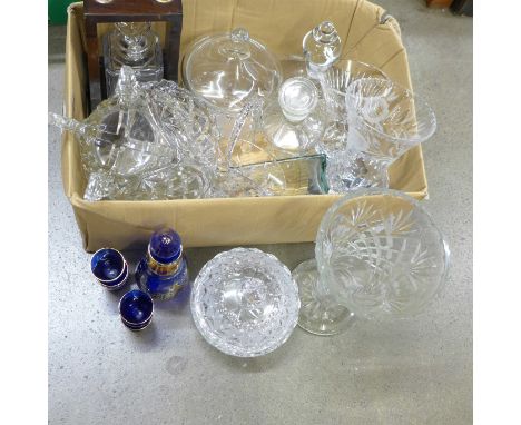 A collection of crystal and glass, including an Orrefors decanter, a crystal decanter in tantalus, a Tipperary crystal vase, 