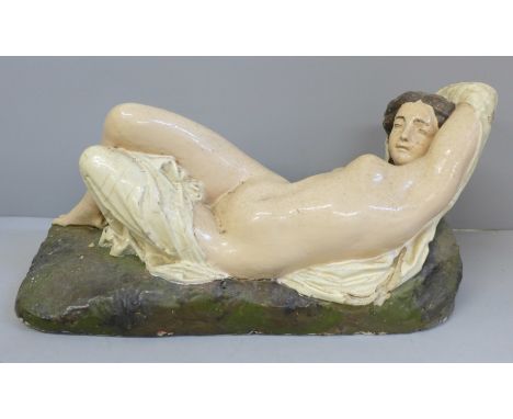 A vintage model of a reclining nude signed R. Wood 