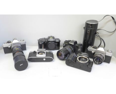 Six 35mm cameras including Rolleiflex, Praktica, Minolta and Nikon 