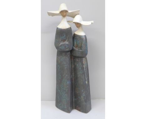A Lladro figure of two nuns, 35cm 