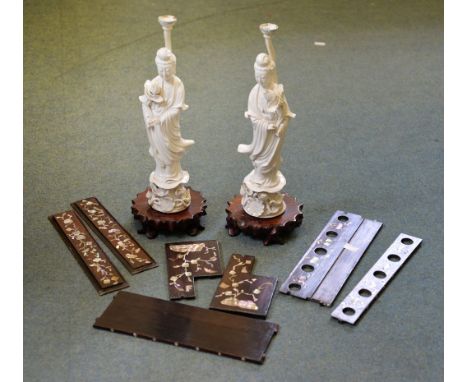 A pair of Chinese Dehua figures of Guanyin, 30.5cm high, adapted as lamps; a Chinese hardwood mother of pearl inlaid pipe hol