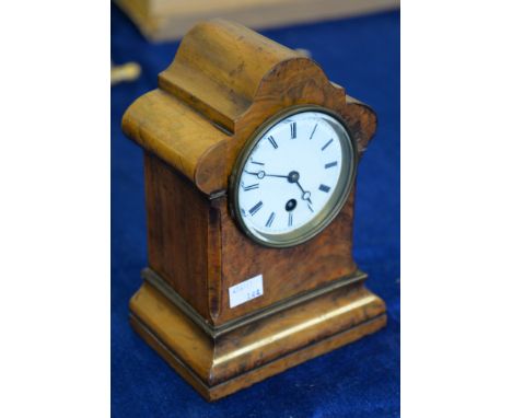 A Victorian walnut mantel timepiece with white enamel Roman numeral dial and  Breguet   hands , 22cm (8 1/2in) high 
