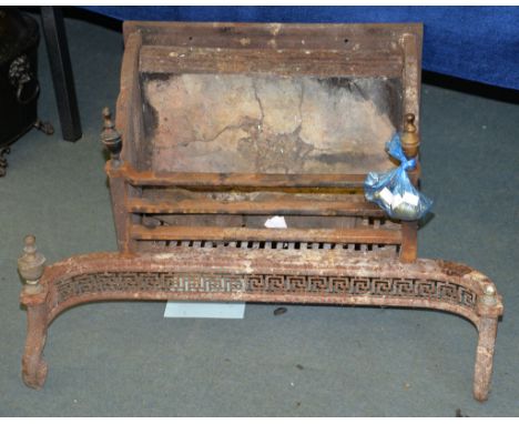 A cast iron fire grate with urn finials and Greek key frieze, together with two clock weights 