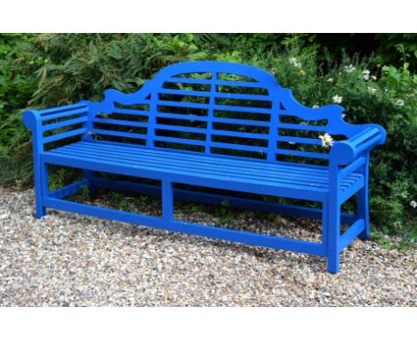 A blue painted garden bench after the manner of  Lutyens , 226cm wide overall  Provenance: The collection of the late Ronnie 