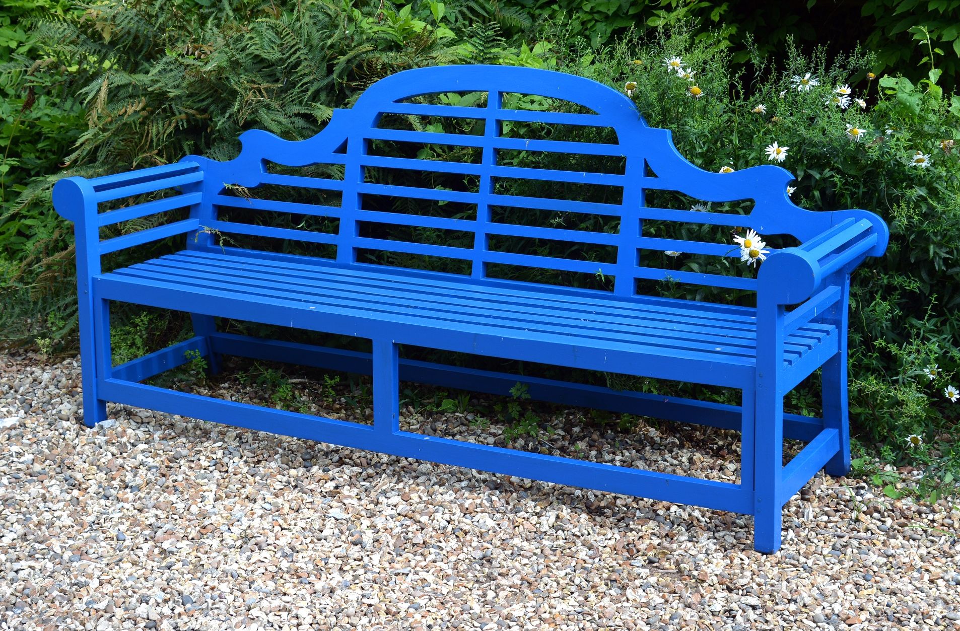 A blue painted garden bench after the manner of Lutyens , 226cm wide