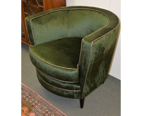 A green velvet upholstered tub armchair, of recent manufacture, by the Sofa  &  Chair Company, London, 70cm high, 77cm wide P