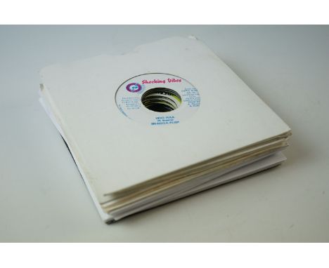 Vinyl - Reggae - Collection of approx 20 45's featuring various labels including Cartell, Opera House, Shocking Vibes, Dutchp