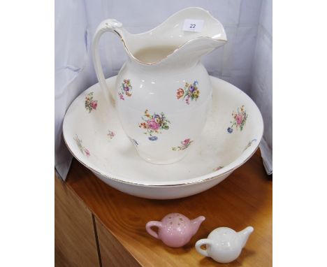 Ceramic toilet ewer and matching basin with floral decoration, and ceramic miniature teapot condiments. 