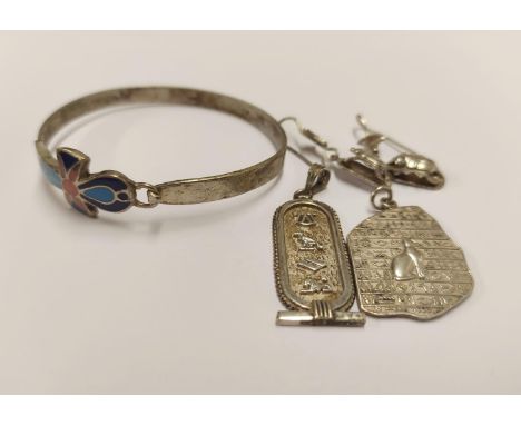 Enamel decorated bangle, pendant, Egyptian pendant and a pair of scarab earrings, all 925 silver, 41g gross. 