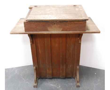 Vintage child's school desk with integral inkwells. 