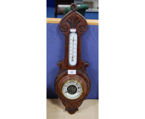 Carved mahogany wall barometer. 