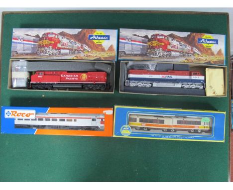 Four 'HO' Gauge Boxed U.S.A Outline Locomotive, comprising a life like Budd RDC, CP Rail day liner R/No 9101 silver/red liver