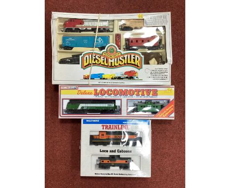Three American HO Gauge Train Packs, by Lifelike, Walthers and Bachmann, all boxed.