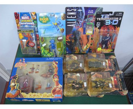 Eight TV/Film Themed Carded Plastic Action Figures by Mattel, Kenner, and others, to include Aliens Alien Queen, T2 Battle Re