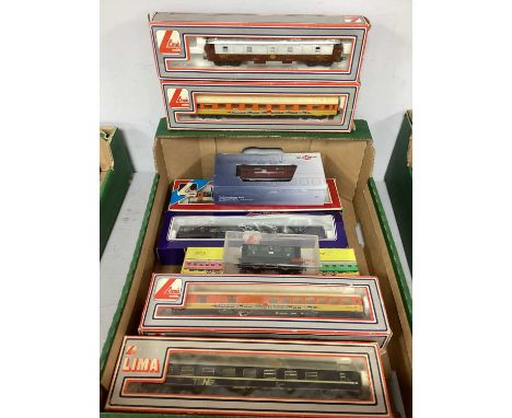 Twelve HO Scale Continental Outline Coaches, by Lima and others, all boxed.