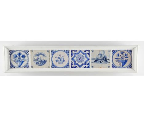 Group of six framed Dutch Delftware ceramic tiles. Featuring designs of flowers in vases, a bowl of fruit, a geometric design