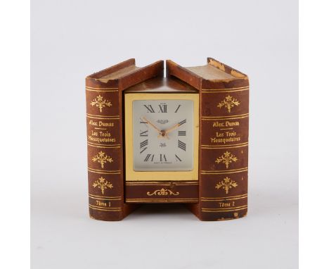 Jaeger Electronic, Paris, France. Table clock comprised of two facsimile books by Alexandre Dumas "Les Trois Mousquetaires" (