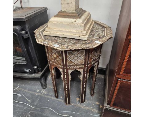 A Moorish octagonal occasional table and a plant stand. 