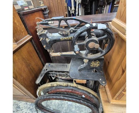 A heavy-duty Singer sewing machine. 
