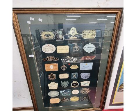 A glazed display of champagne labels. 