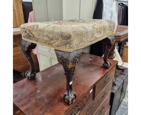 A Georgian-style dressing stool with tapestry upholstery. 