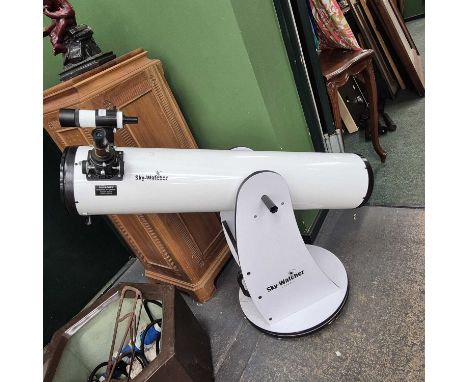 A skywatcher large telescope.