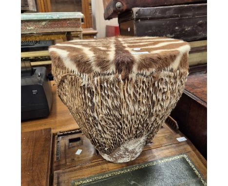 An African zebra hide drum. 