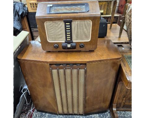 A floor-standing radiogram and a large vintage radio.