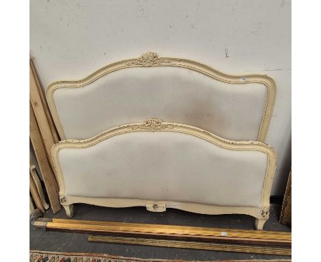 A French-style double bed with a painted show frame. 