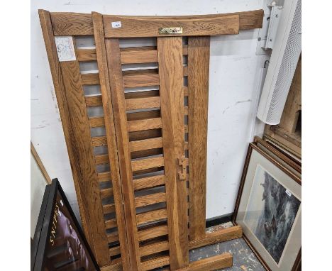 A modern oak double bed. 