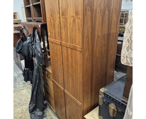 A modern walnut two-door wardrobe. 