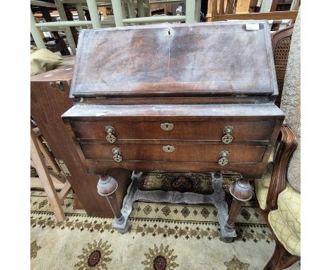 A Queen Anne-style bureau. 