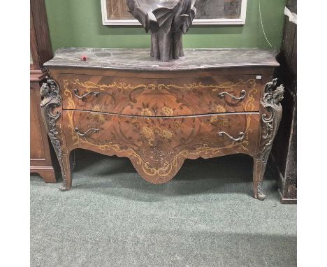A French-style two-drawer commode chest. 