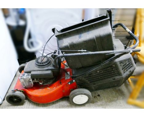 A Champion petrol rotary lawn mower (sold as seen)