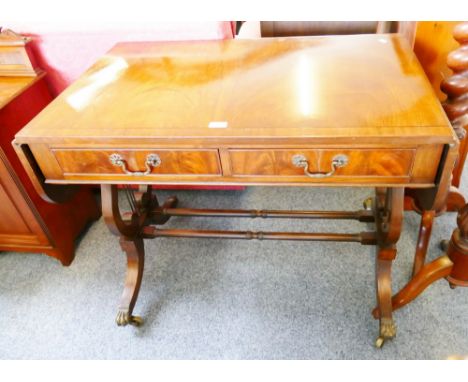 Reproduction Regency style cross-banded mahogany sofa table with lyre supports, 137cm wide extended