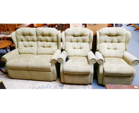 A 3-piece suite, comprising a 2-seater sofa together with 2 matching electric reclining armchairs (3)