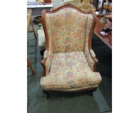 FRENCH STYLE WING ARMCHAIR, scroll carved crested tapestry upholstery wing armchair on French cabriole legs 