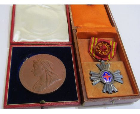 RED CROSS MEDAL, a Oriental Star with a Red Cross on blue enamel ground in fitted box also Victorian Diamond Jubilee Commemor