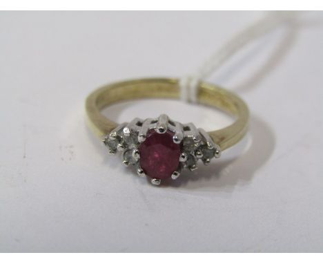 9ct YELLOW GOLD RUBY &amp; DIAMOND RING, principal oval cut ruby with accent brilliant cut diamonds to each shoulder in 9ct y