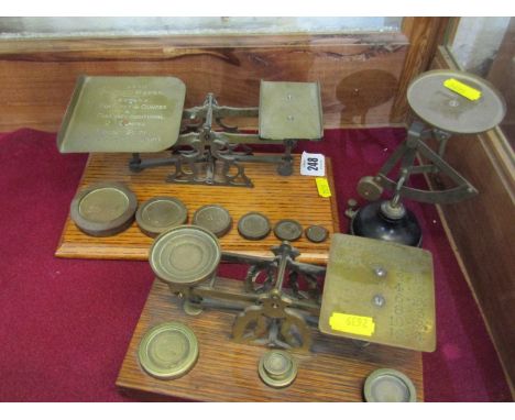 POSTAL SCALES, oak based postal scales, '1 penny - 4 ozs' with 6 graduated weights, together with similar scales, '1oz- 1d', 