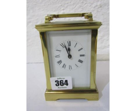 CARRIAGE CLOCK, a brass cased carriage clock with key 