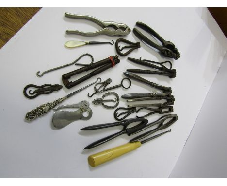 BUTTON HOOKS, collection of over 30 various button hooks and crochet hooks, 2 with silver handles, also 10 vintage nut cracke