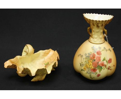 A Royal Worcester blush ivory lobed vase, painted with flowers, the neck of naturalistic design with gilt highlights, dated 1