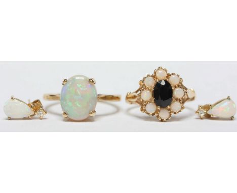 A 14ct gold sapphire and opal cluster ring, 3.2 grams, together with a 9ct gold ring claw-set with a single oval Opal, and pa