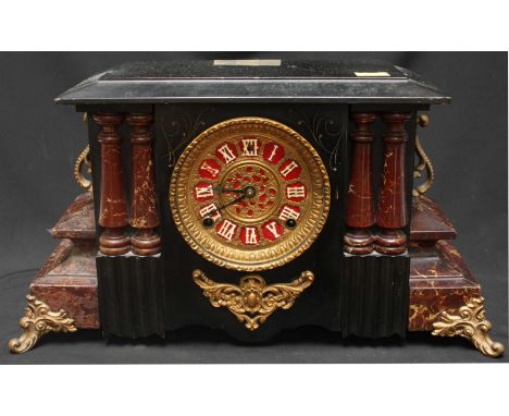 A Victorian simulated marble mantel clock, with red painted dial and gilt metal mounts.