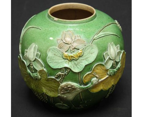 A Chinese Wang Bing Rong pottery ginger jar, the green glazed globular body decorated with applied leaves, flowers and a cran