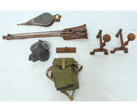 A set of wrought iron fire tools, together with a WWII gas mask in case, and a set of bellows.