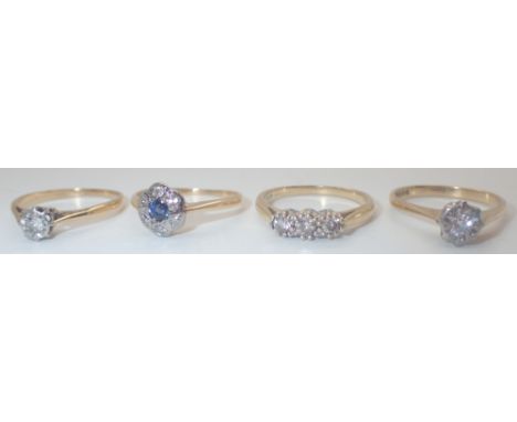 Four 18ct yellow gold and diamond set rings three size K one size L 8.1g   CONDITION REPORT:  One ring has marks worn, but no