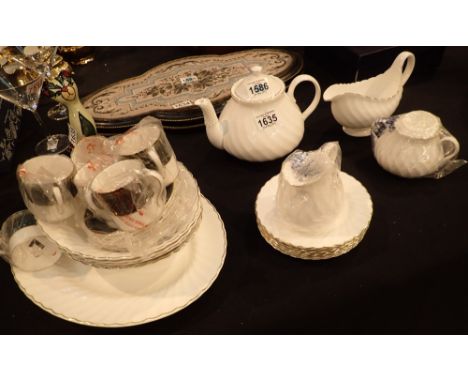 Wedgwood Gold Chelsea part tea service ( sixteen pieces ) and a set of six Spode Royal Windsor coffee cans with saucers